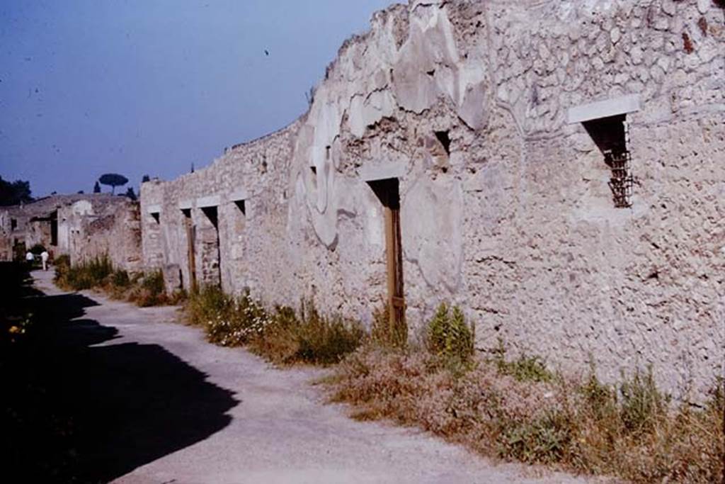 Via di Castricio, Pompeii. 1964. Looking west along 1.12, on the north side between 1.15 and I.12. Photo by Stanley A. Jashemski. 
Source: The Wilhelmina and Stanley A. Jashemski archive in the University of Maryland Library, Special Collections (See collection page) and made available under the Creative Commons Attribution-Non Commercial License v.4. See Licence and use details.
J64f1845
