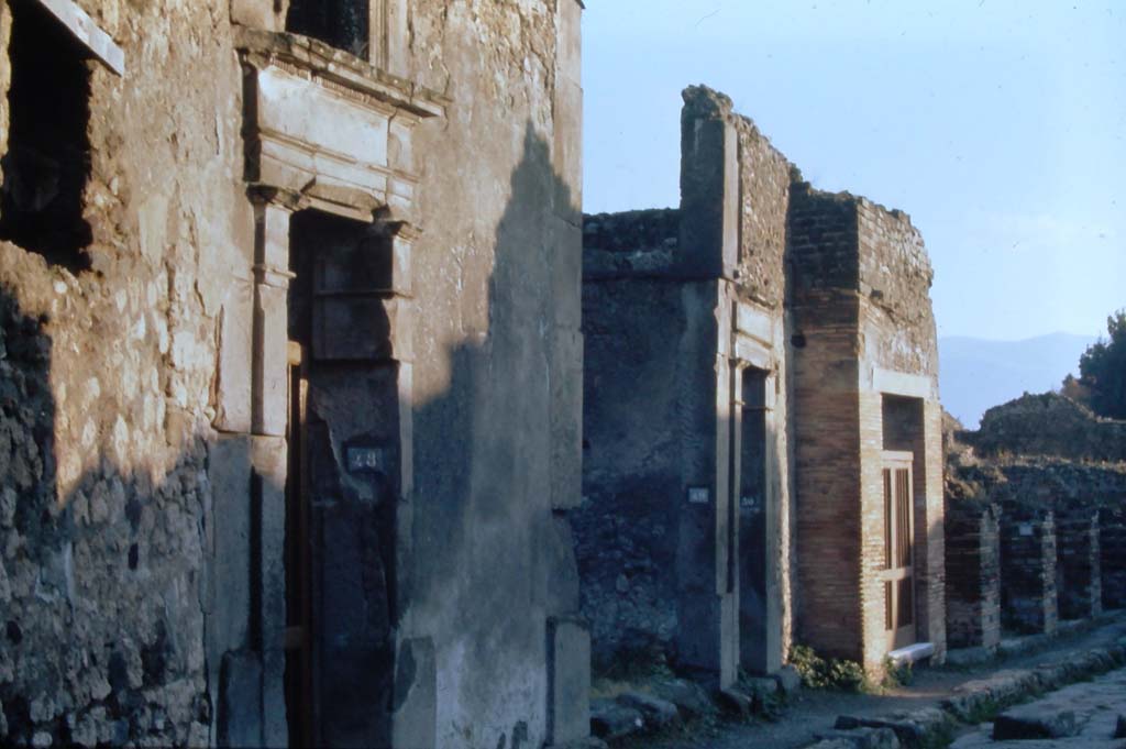 Vicolo del Lupanare, Pompeii, east side. 4th December 1971. Looking south from near VII.1.48. 
Photo courtesy of Rick Bauer, bought from Dr George Fay’s slides collection.

