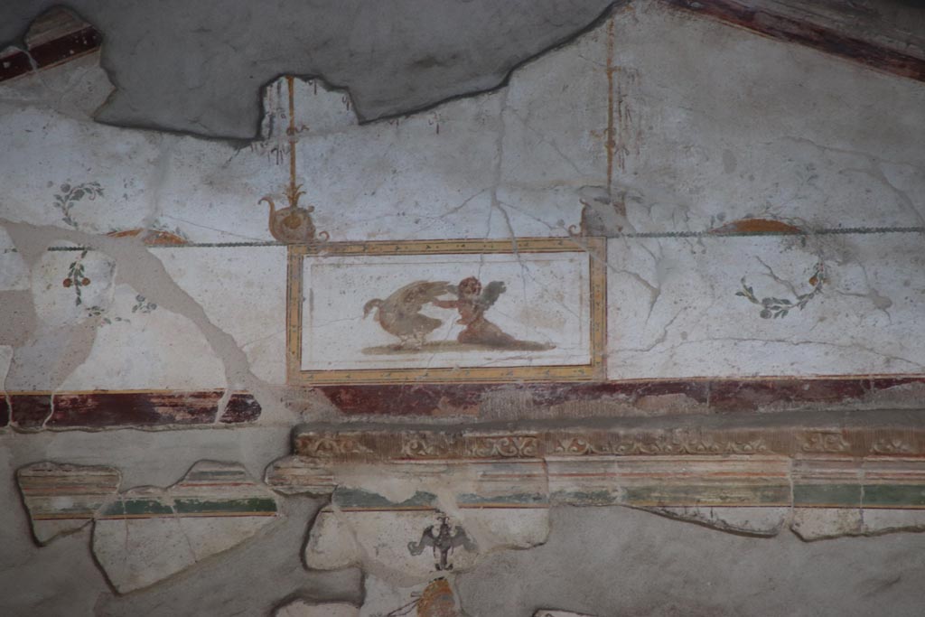 Villa of Poppaea, Oplontis, October 2023. 
Area 60, detail of painted decoration from north wall above doorway to room 97. Photo courtesy of Klaus Heese. 
