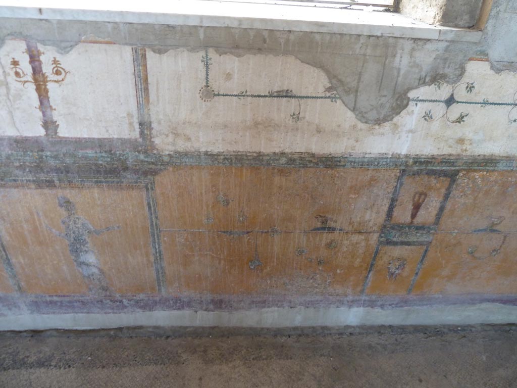 Stabiae, Villa Arianna, September 2015. Room 12, lower wall and zoccolo (dado) of south wall under window.