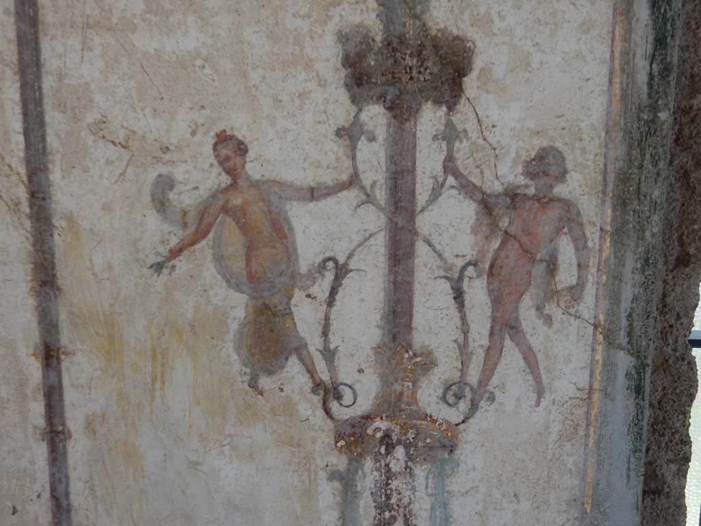 Stabiae, Villa Arianna, June 2019. Room 12, detail of flying figures from south end of west wall.
Photo courtesy of Buzz Ferebee.
