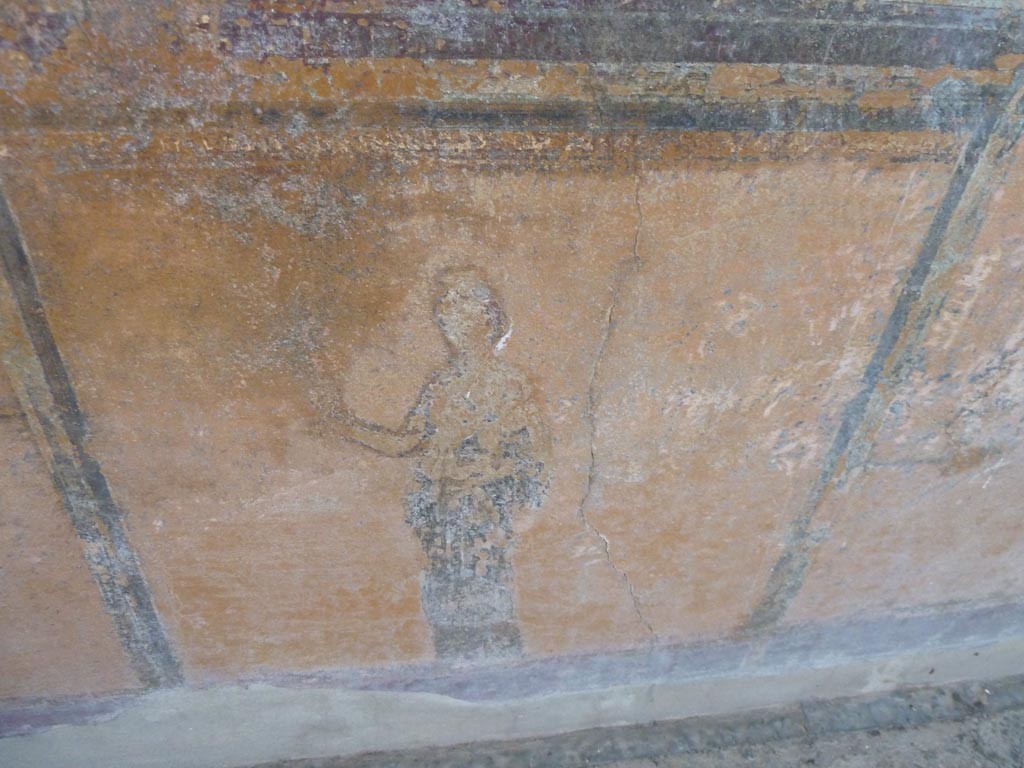 Stabiae, Villa Arianna, September 2015. Room 12, painted figure from zoccolo on west wall, under south end of window.
