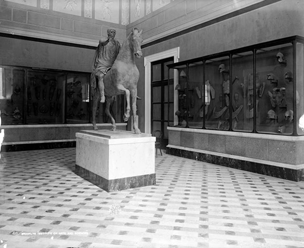 Arch of Caligula. 1895 photo of equestrian statue, found in pieces beneath the arch and rebuilt.
Now in Naples Archaeological Museum. Inventory number 5635.
Photo courtesy of Brooklyn Museum Archives, William Henry Goodyear [No restrictions], via Wikimedia Commons (S03_06_01_001 image 199).

 

