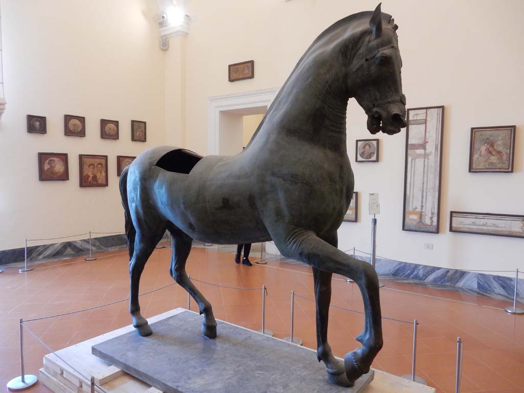 Arch of Caligula, Pompeii. June 2019. Bronze horse, found in pieces beneath the arch.
This was reconstructed and is now in Naples Archaeological Museum.
Photo courtesy of Buzz Ferebee.
