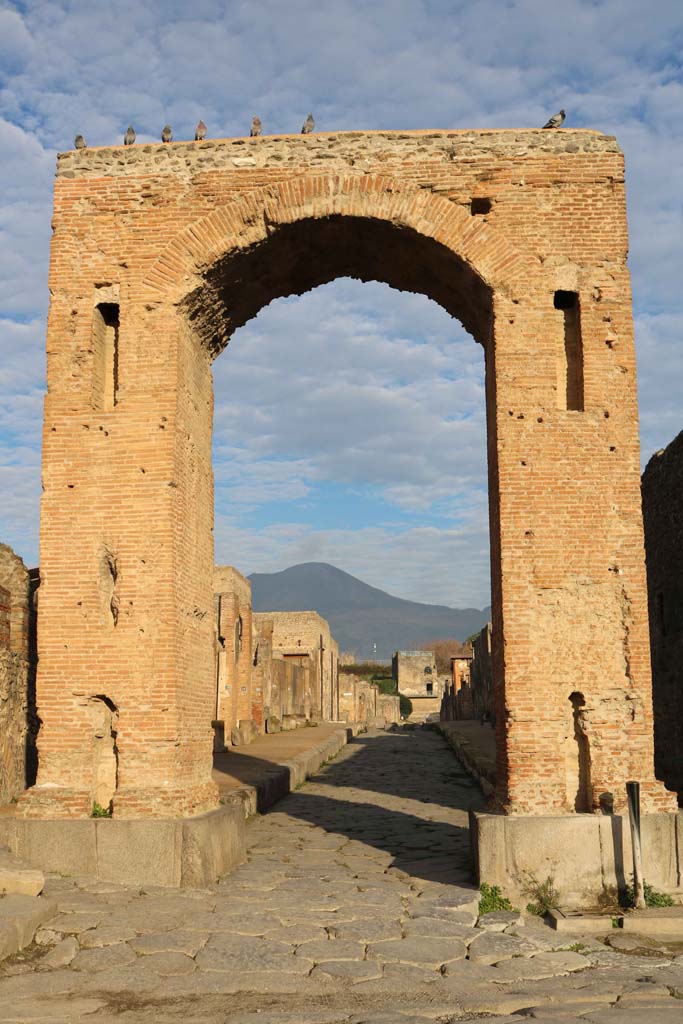 Arch of Caligula, Pompeii. December 2018.  
South side, looking north along Via Mercurio towards Tower XI. Photo courtesy of Aude Durand.
