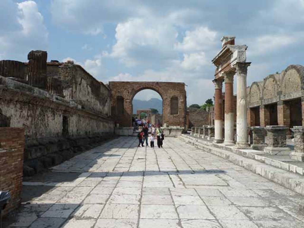 Arch at North East End of the Forum. May 2010. Looking north to arch from site of demolished Arch of Nero.