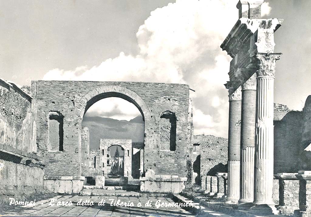Arch at north-east end of the Forum. Postcard dated 5th July 1956, "L'arco detto di Tiberio o di Germanico".
Photo courtesy of Peter Woods.
