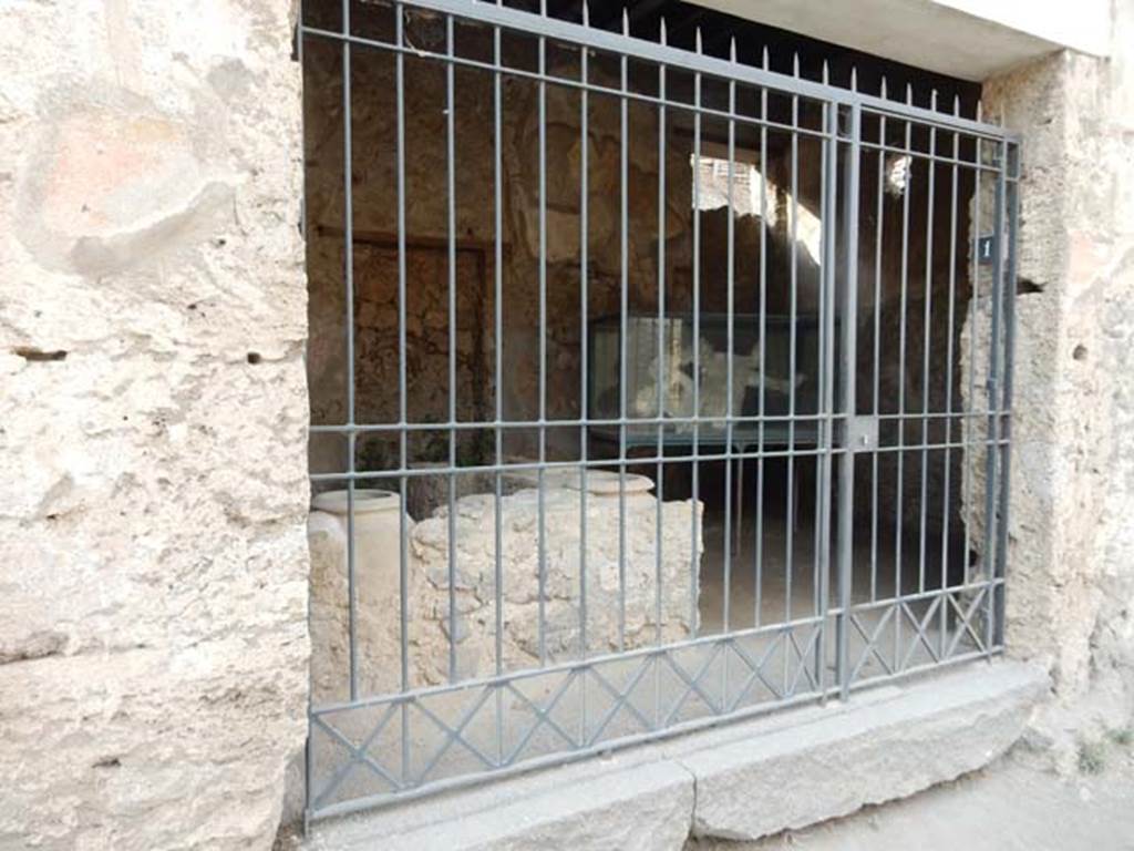 III.6.1 Pompeii. May 2017. Entrance doorway with cast of victim 27 seen at rear. Photo courtesy of Buzz Ferebee.