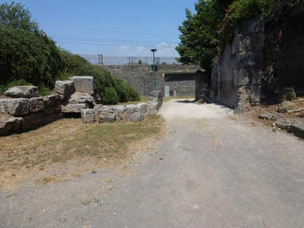 Porta di Sarno or Sarnus Gate. June 2012. Looking east out of the city along the north side of the gate, at the east end of Via dell’Abbondanza. Photo courtesy of Michael Binns.

