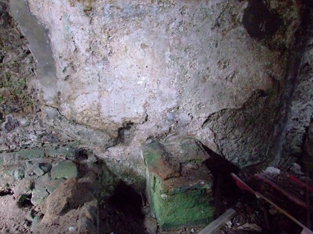 VI.9.10 Pompeii. March 2009. North wall of kitchen with remains of altar.