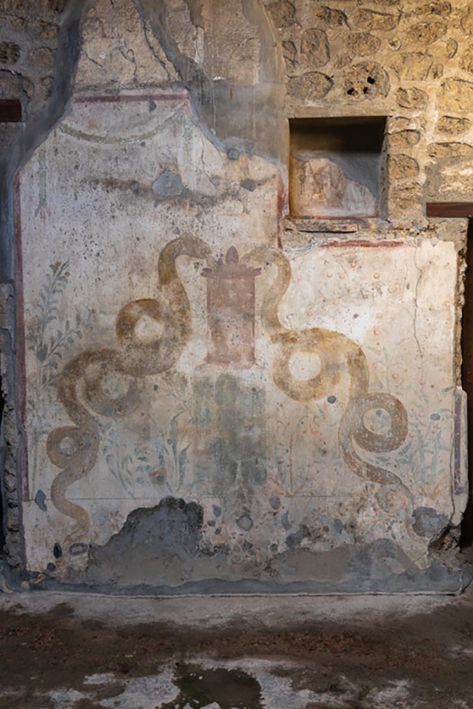 VI.16.15 Pompeii. January 2024. Lararium on north wall of atrium. Photo courtesy of Johannes Eber.