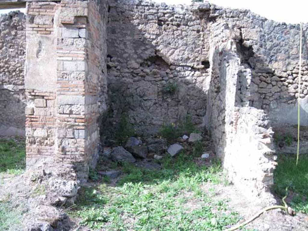 I.2.24 Pompeii. September 2010. Looking north into small room on east side of atrium. Photo courtesy of Drew Baker.
