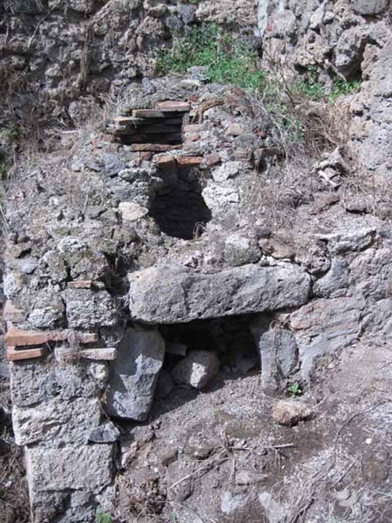 I.2.28 Pompeii. September 2010. Looking north to remains of oven in kitchen area. Photo courtesy of Drew Baker.
