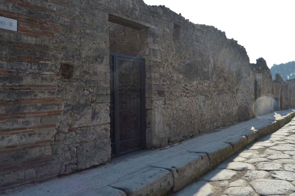 I.3.24 Pompeii. October 2017. Looking west along Vicolo del Menandro from outside entrance doorway, centre left. 
Foto Taylor Lauritsen, ERC Grant 681269 DCOR.
