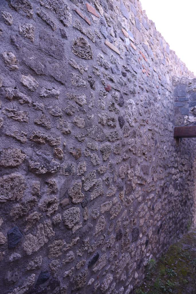 I.4.25/I.4.5 Pompeii. October 2019. 
Looking south along east wall from north end of Corridor 13A, or unnumbered corridor. 
Foto Tobias Busen, ERC Grant 681269 DCOR.
