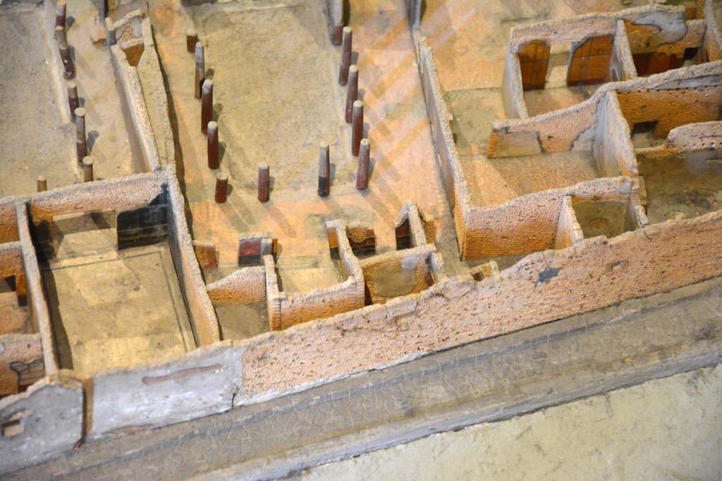 I.4.25 Pompeii. Upper Peristyle 56. May 2019. Detail from model in Naples Archaeological Museum. 
Looking at east end of upper peristyle 56, with rooms 59 to 64, lower centre.
Foto Tobias Busen, ERC Grant 681269 DCOR.
