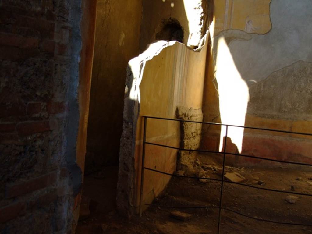 I.6.4 Pompeii.  March 2009.  Room 4.  North wall with entrance to area under stairs.