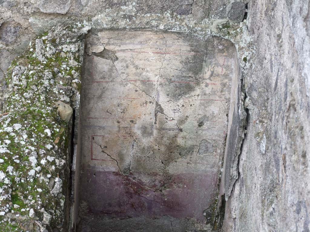 I.7.1 Pompeii. December 2006. Lower level, corridor. Remains of painted plaster.