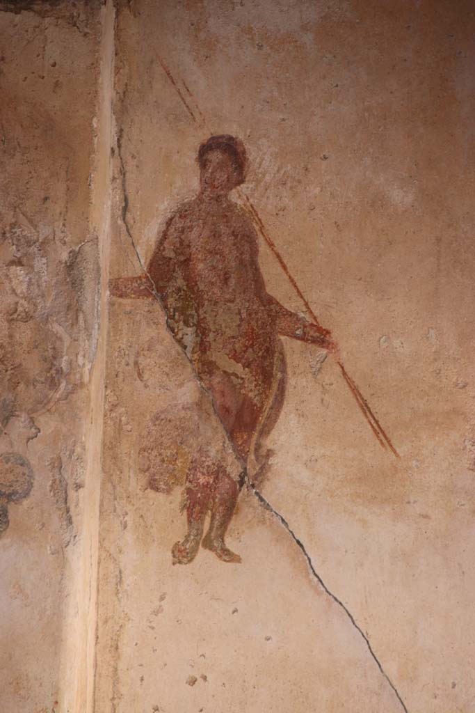 I.7.11 Pompeii. September 2021. 
Detail of second figure from panel at east end of north wall of triclinium. Photo courtesy of Klaus Heese.
