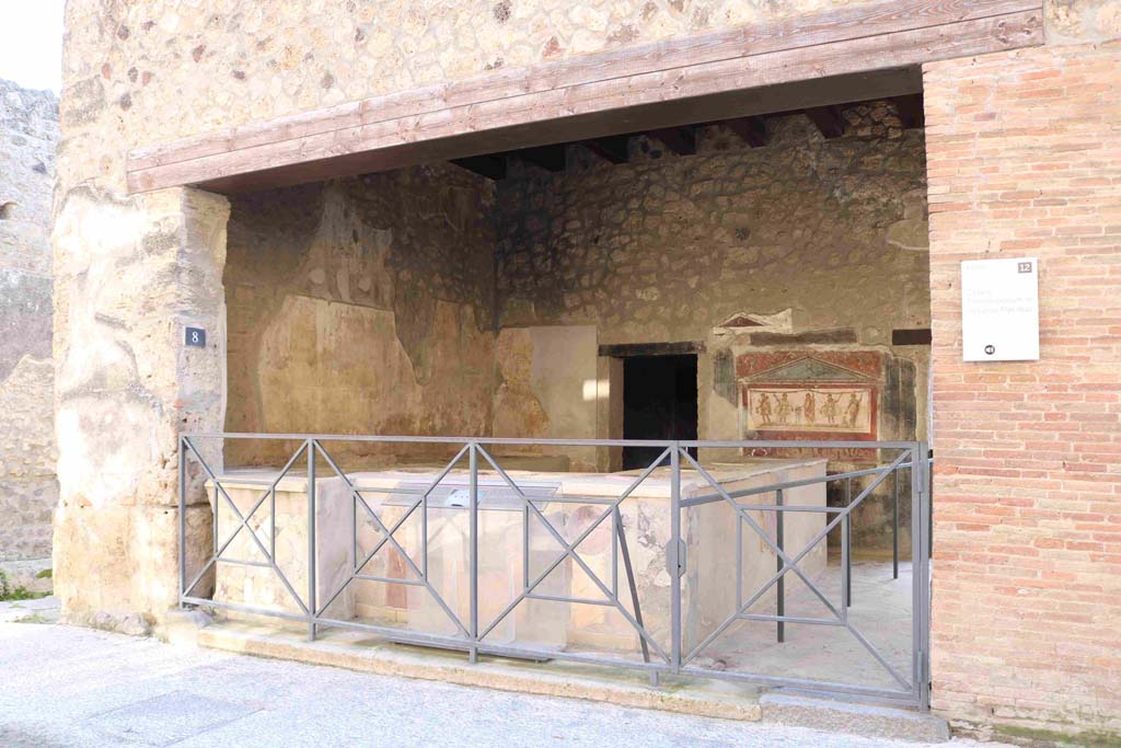 I.8.8 Pompeii. December 2018. Entrance doorway on south side of Via dell’Abbondanza. Photo courtesy of Aude Durand.