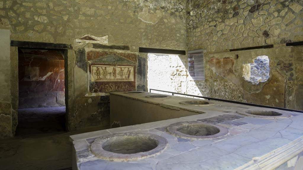 I.8.8 Pompeii. August 2021. Looking south-west across bar-counter. Photo courtesy of Robert Hanson.