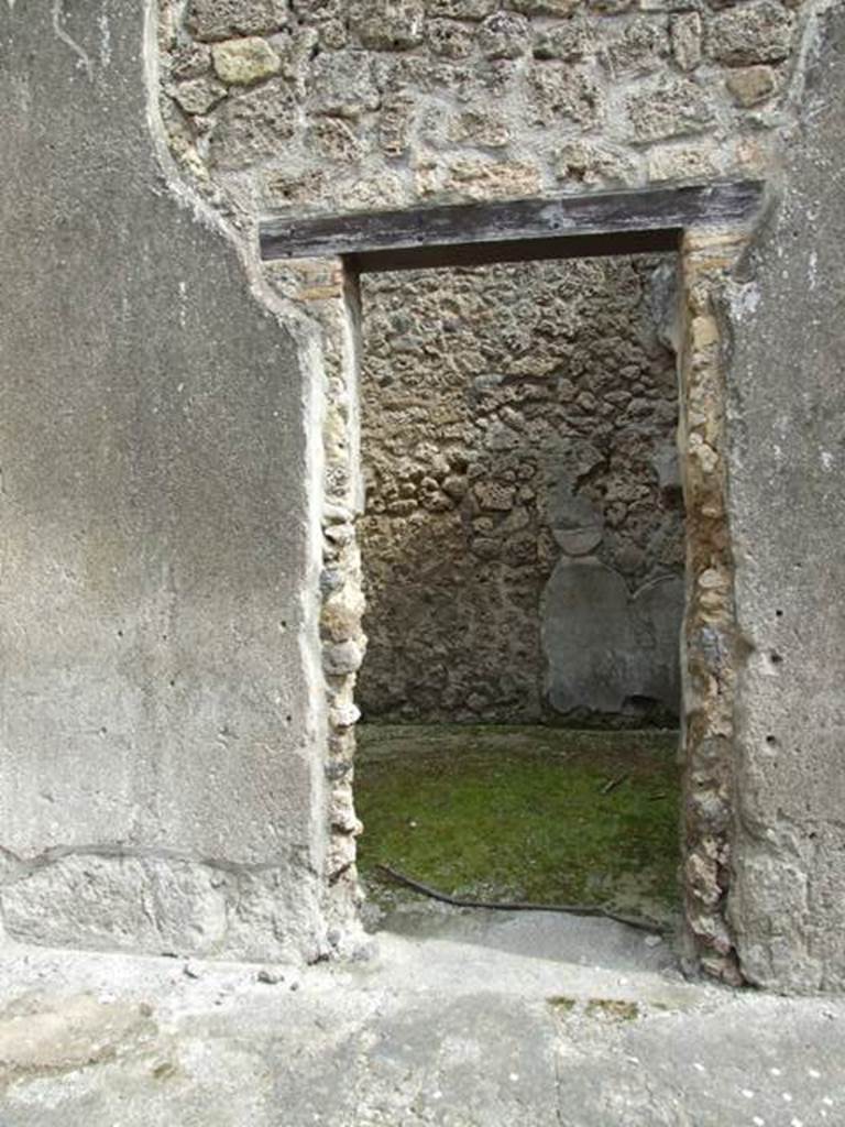 I.9.1 Pompeii.  March 2009.  Room 12, Doorway from atrium.