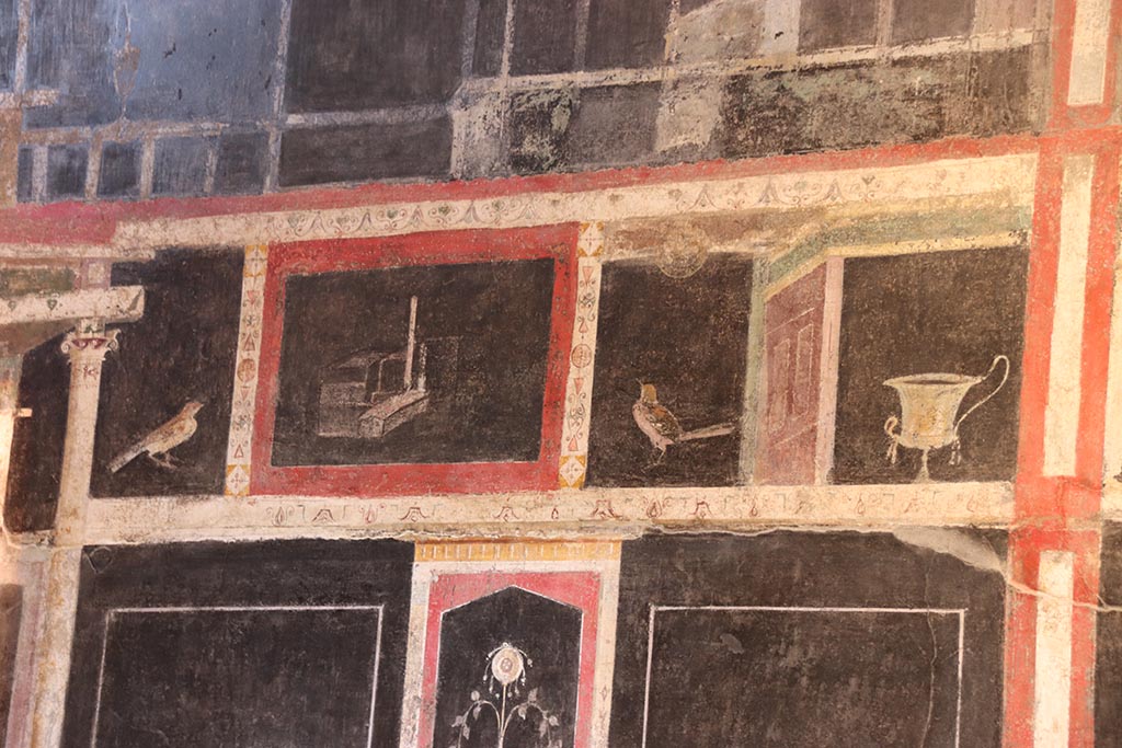 I.9.5 Pompeii. October 2024. Room 10, detail from upper east wall. Photo courtesy of Klaus Heese