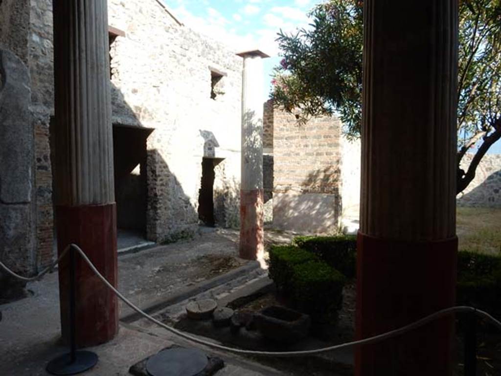 I.9.5 Pompeii. May 2017. Room 12, looking south-east across peristyle garden from north portico. Photo courtesy of Buzz Ferebee.
