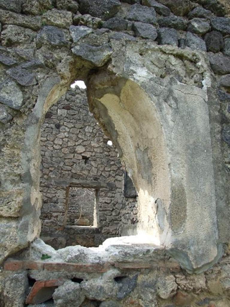 I.9.12 Pompeii. March 2009. Room 5, remains of lararium niche in west wall.