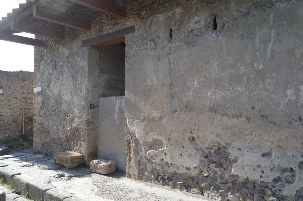 I.9.13 Pompeii. March 2019. Looking west on Via di Castricio towards entrance doorway.
Foto Taylor Lauritsen, ERC Grant 681269 DCOR.
