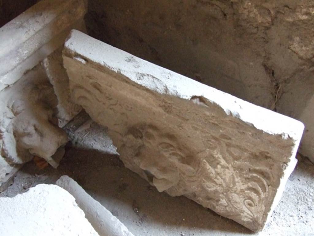 I.10.7 Pompeii. March 2009.  Room 3.   Cubiculum.  Remains of a Lion.  Grondaia or antefisse fittili  (rainwater spouts for gutters).