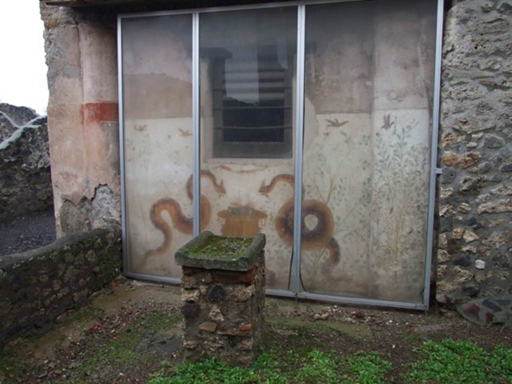 I.11.15 Pompeii. December 2007. Room 10. Garden area with altar in front of painted Lararium.