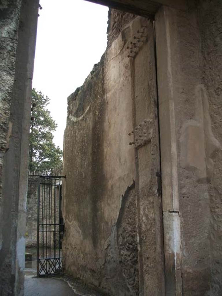 II.2.2 Pompeii. May 2016. West side of entrance doorway with plaster cast. Photo courtesy of Buzz Ferebee.