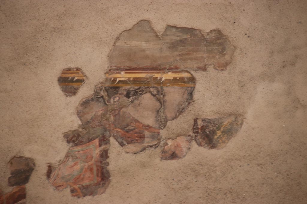 II.2.2 Pompeii. October 2022. Triclinium “h”, detail from north wall at east end. Photo courtesy of Klaus Heese


