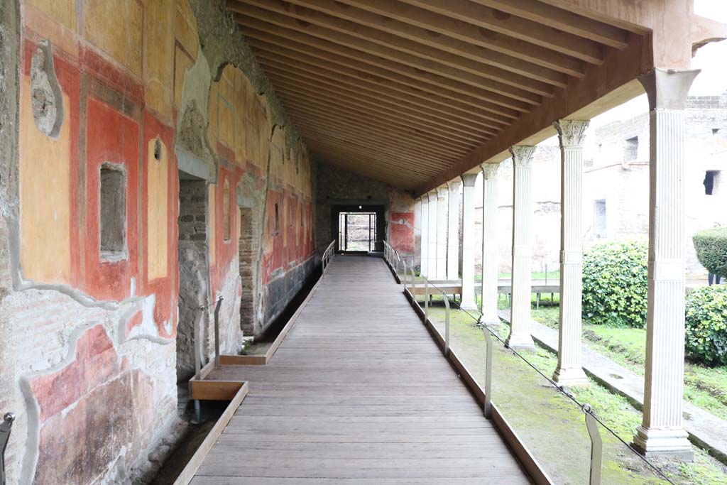 II.4.6 Pompeii. December 2018. Looking north along west portico towards doorway into II.4.2/3. Photo courtesy of Aude Durand.