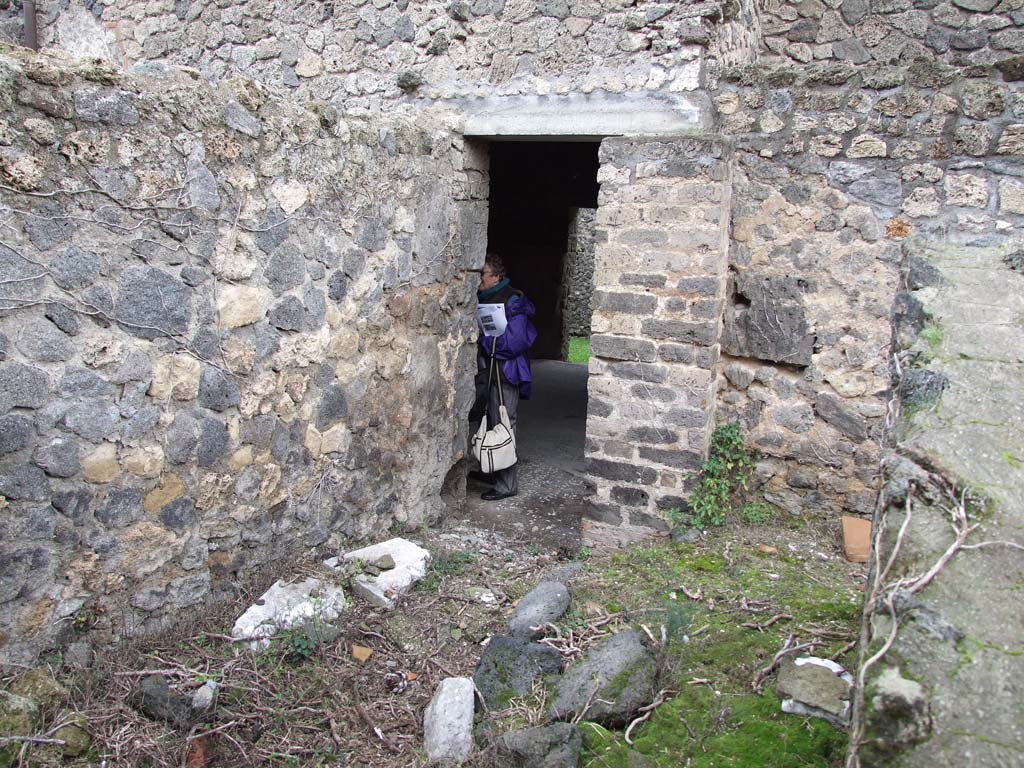 II.4.12 Pompeii. December 2006. Doorway into atrium area of II.4.3, looking east.