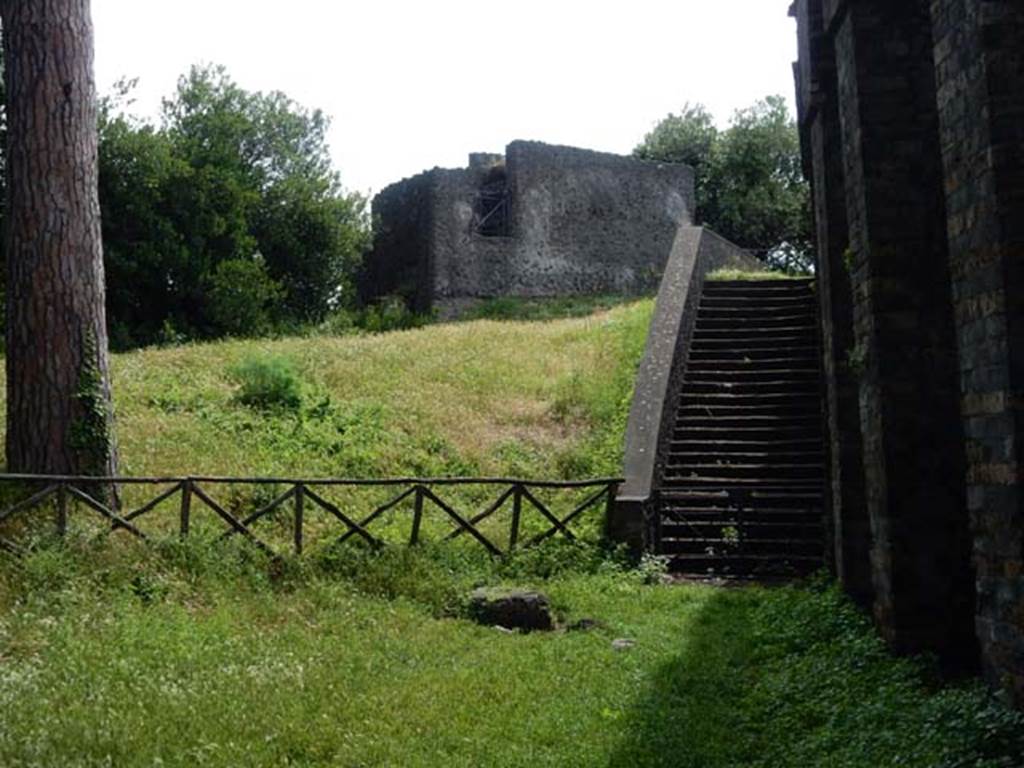 II.6 Pompeii, May 2018. North end of Amphitheatre, with steps to upper area. Photo courtesy of Buzz Ferebee.