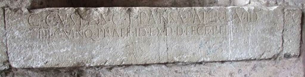 6 Pompeii. December 2006. Inscription from east side of corridor of Amphitheatre. The inscription reads –
C. CVSPIVS C. F. PANSA PATER D. V. I  D
IIII. QVINQ. PRAEF. ID. EX. D. D. LEGE. PETRON.
One of two inscriptions to father and son, Cuspius Pansa.  
They restored the Amphitheatre at their own expense after the earthquake of AD62.
According to Pagano and Prisciandaro, this read –
C(aius) Cuspius C(ai) f(ilius) Pansa pater d(uum) v(ir) i(ure) d(icundo)
IIII quinq(uennalis) praef(ectus) i(ure) d(icundo) ex d(ecreto) d(ecurionum) lege Petron(i)    [CIL X 858]  See Pagano, M.  and Prisciandaro, R., 2006. Studio sulle provenienze degli oggetti rinvenuti negli scavi borbonici del regno di Napoli.  Naples : Nicola Longobardi. 
(p.110)

