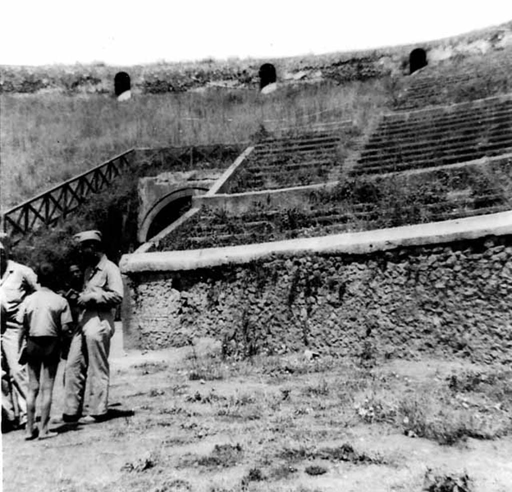 II.6 Pompeii. 1944. Arena and seating of Amphitheatre, north-east corner. Photo courtesy of Rick Bauer.