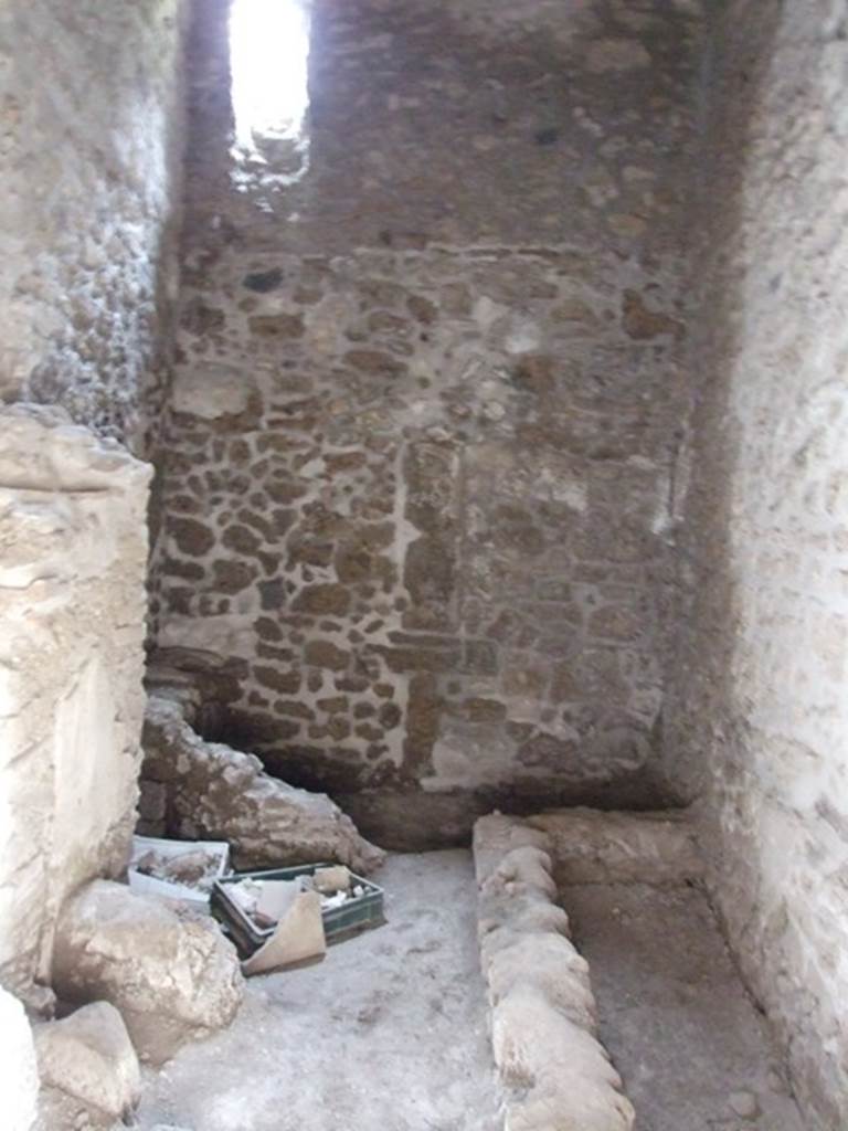 III.2.1 Pompeii.  March 2009.  Room 11.  Kitchen, with hearth, latrine and praefurnium or boiler for the Baths area