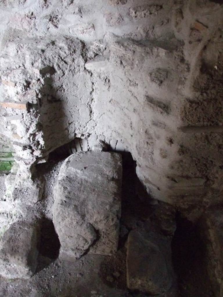 III.2.1 Pompeii. March 2009. Room 11, area of praefurnium with the impression of a boiler in the wall above.