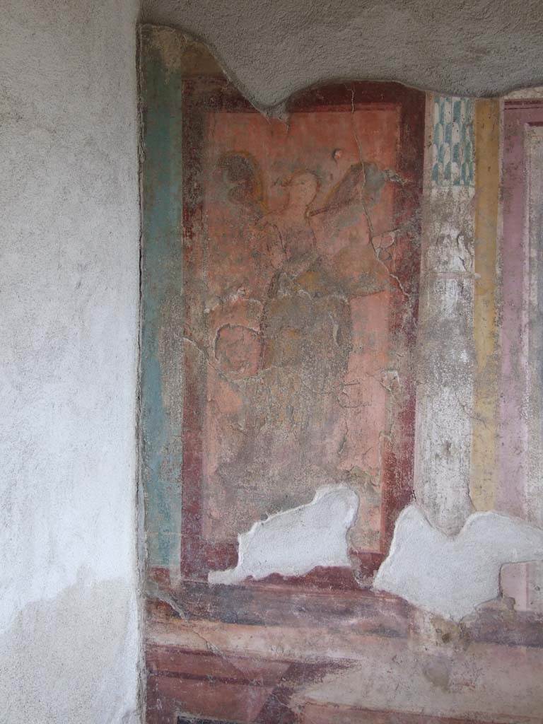 V.1.18 Pompeii. March 2009. 
East wall of exedra “y”, at north end. Wall painting of a winged lyre player or muse.
See Leach, E.W., 2004. The Social Life of Painting in Ancient Rome and on the Bay of Naples. Cambridge UK: Cambridge UP. (p.135).
