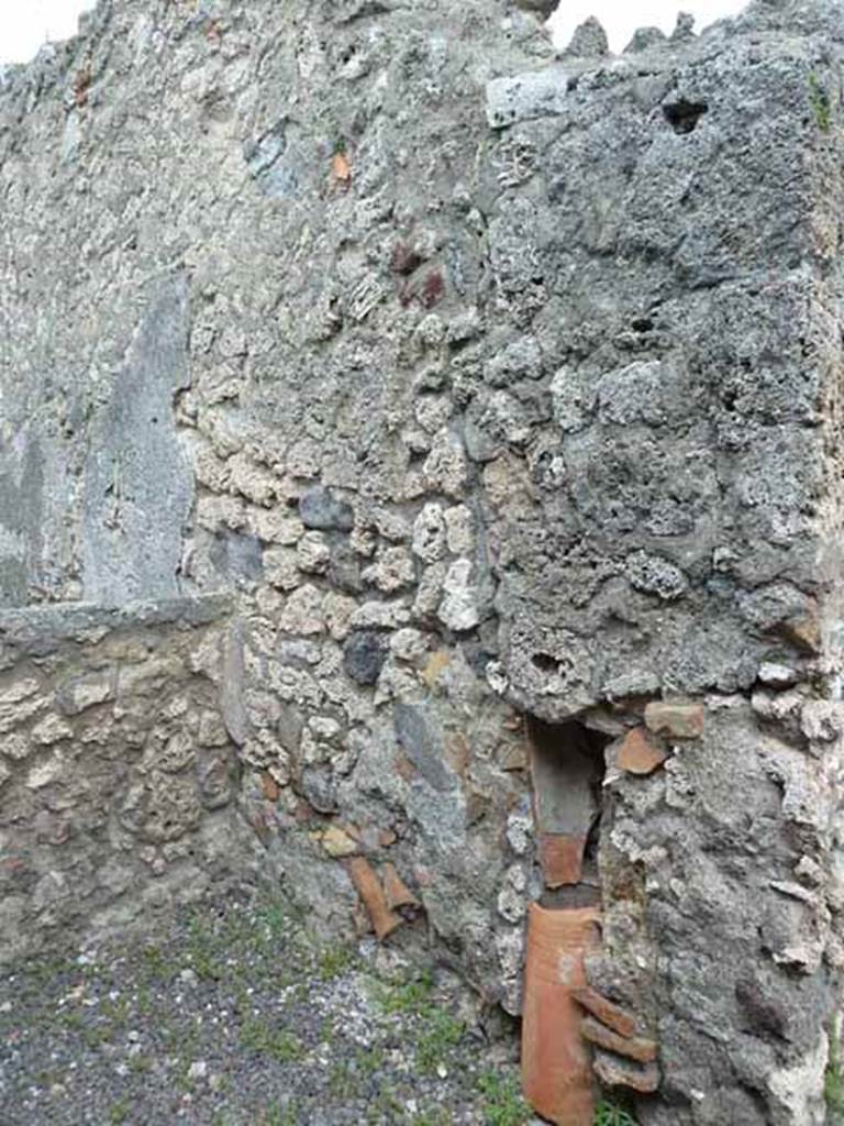 V.2.9 Pompeii. May 2010. East wall of rear room.