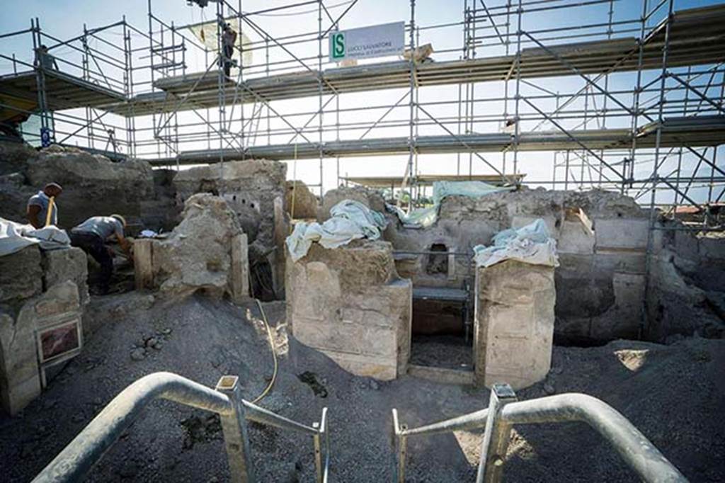 V.2.15 Pompeii. August 2018. Rooms on south side of atrium A12. A first style room A11 is in the centre. 
Room A13, room with white walls with a floral design is on the right.
Left is room A17 and on the east side is room A3.
Photograph © Parco Archeologico di Pompei.
