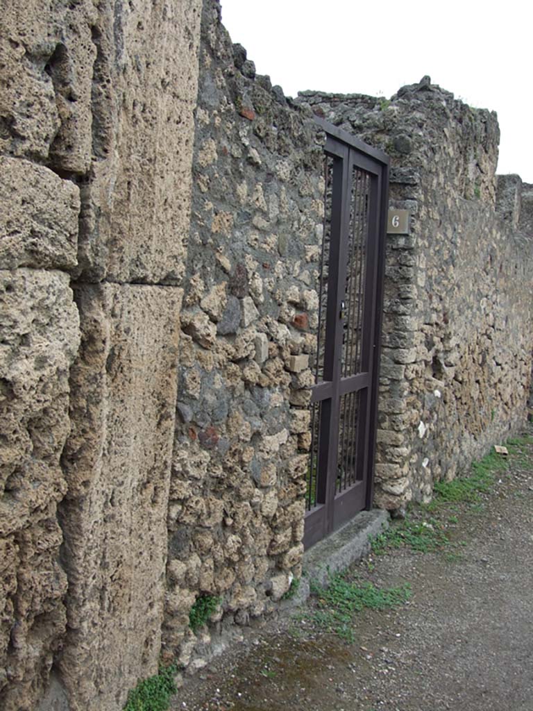 V.3.6 Pompeii. May 2010. Entrance doorway, looking east on Via di Nola.