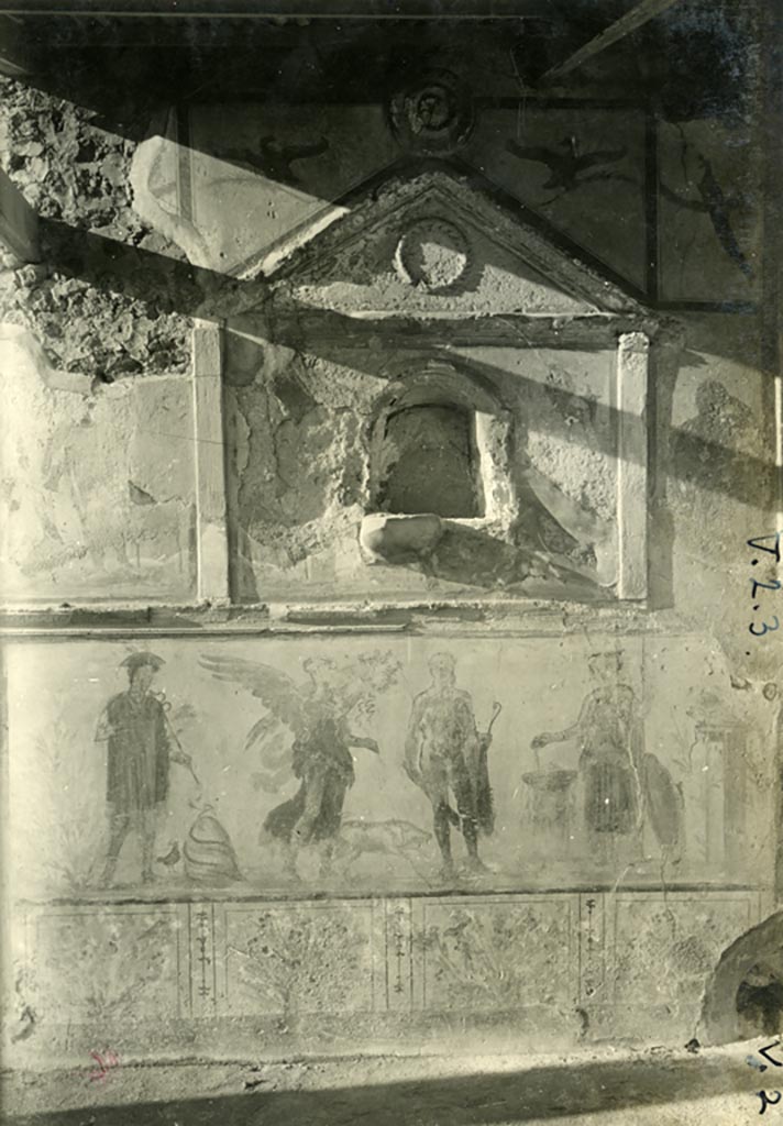 V.4.3 Pompeii but shown as V.2.3 on photo. Pre-1937-39. Lararium on west wall of atrium.
Photo courtesy of American Academy in Rome, Photographic Archive. Warsher collection no. 1708.

