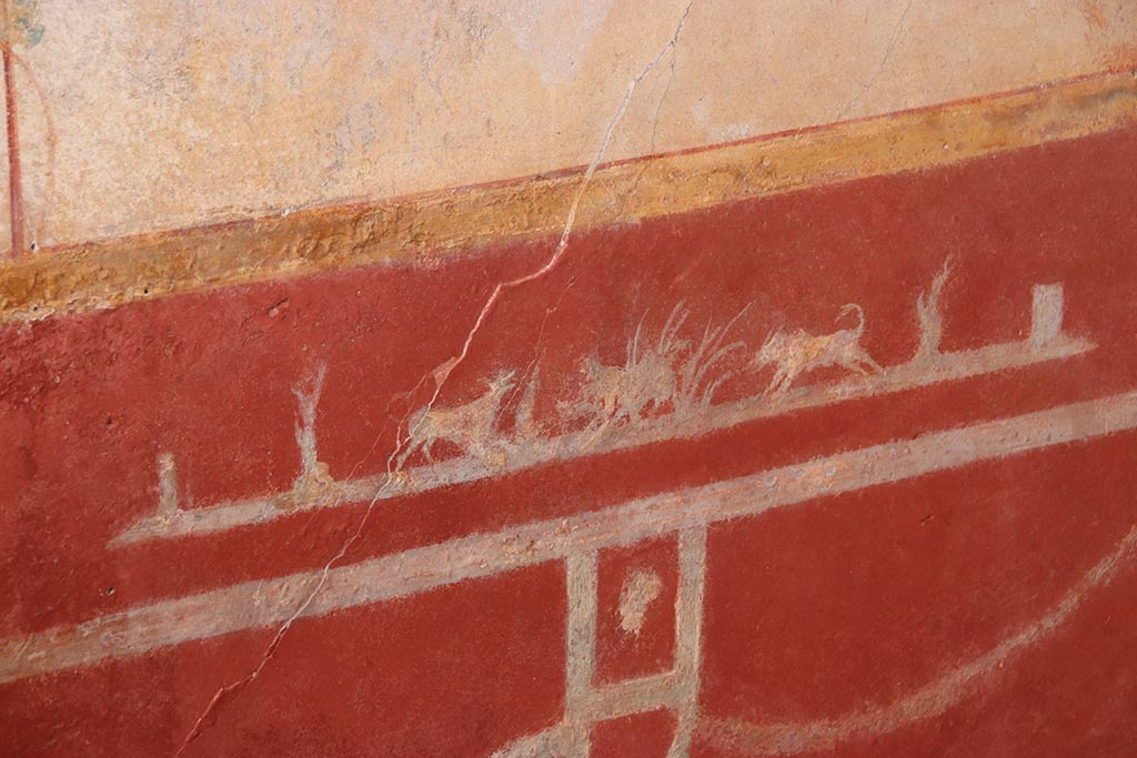 V.6.12 Pompeii. October 2024. Cubiculum 9, detail from centre of lower north wall. Photo courtesy of Klaus Heese.