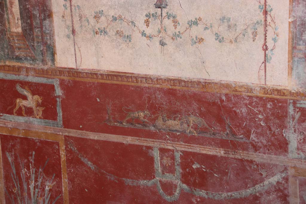 V.6.12 Pompeii. October 2020. Amb. 9. Centre of red zoccolo/dado on south wall of cubiculum. Photo courtesy of Klaus Heese.