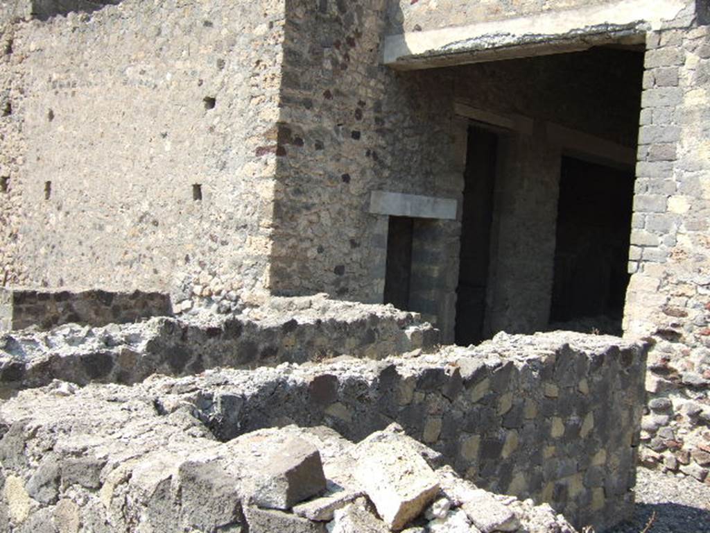 VI.2.31 Pompeii. May 2006. Looking north-west along rooms on west side of portico of peristyle.