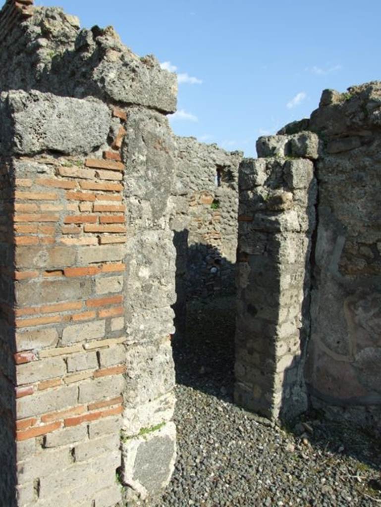 VI.7.3 Pompeii. March 2009.  Doorway in south-east corner of room 1, atrium, leading to garden.
